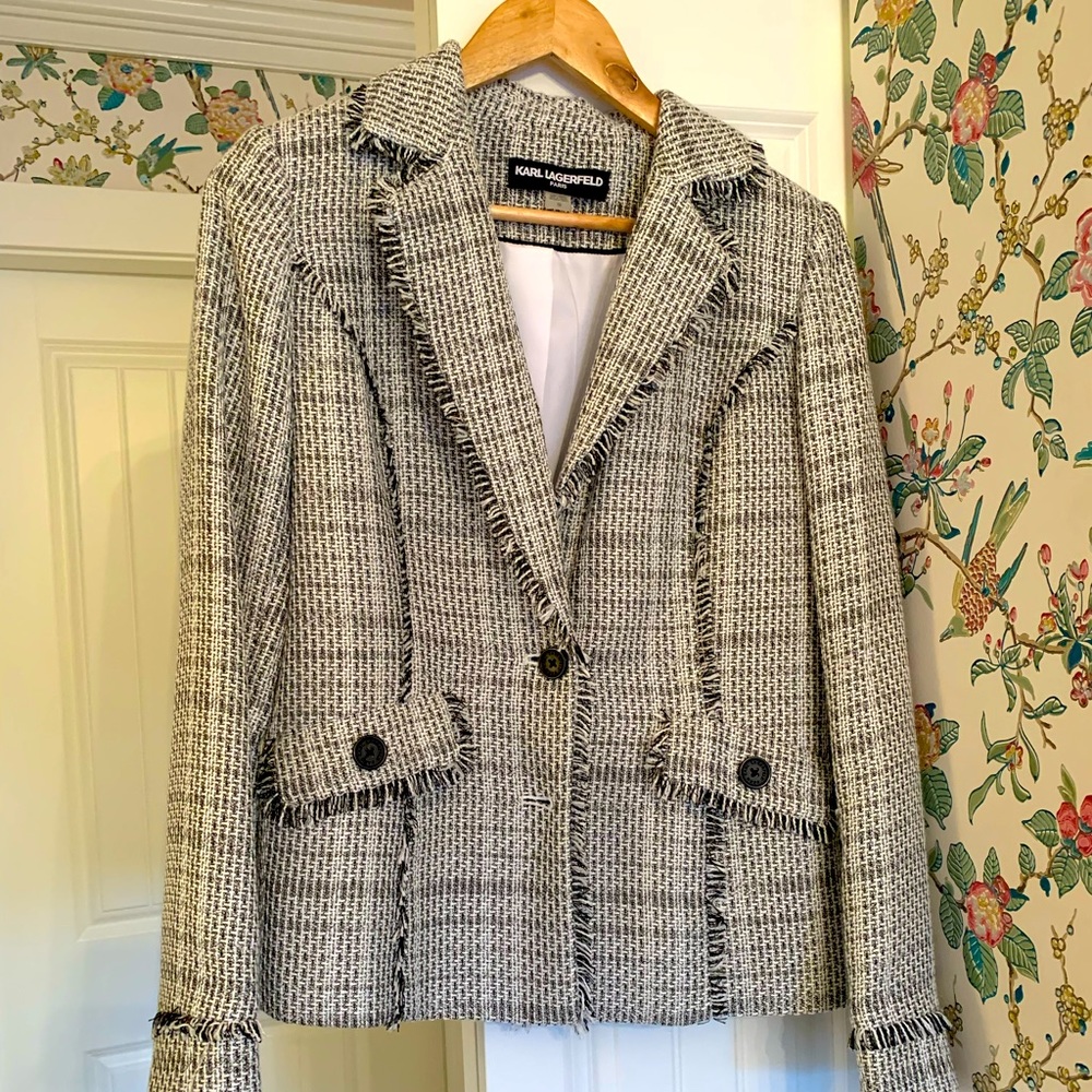 Chanel style blazer with fringe trim.